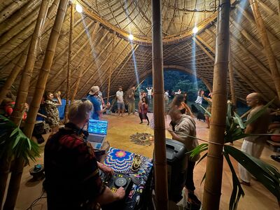 Ecstatic dance crowd, bamboo venue